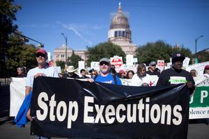 Death Row Exonerees leading a March to Abolish the Death Penalty in Austin